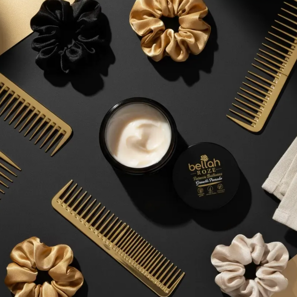 Hair care products including scrunchies, a jar of cream, and combs on a black surface with 'bellah ROSE' branding.
