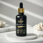 Bellah Roze growth serum bottle on a white surface with a light background