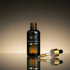 Black serum bottle with dropper on a reflective surface and gradient background