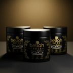 Three jars of bellah ROZE Pomade on a dark background